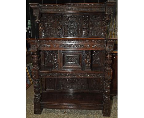 Elizabethan style buffet, 19th century, with some earlier panels, dated 1682 and carved 'I AND MY HOUSE WILL SERVICE THE LORD