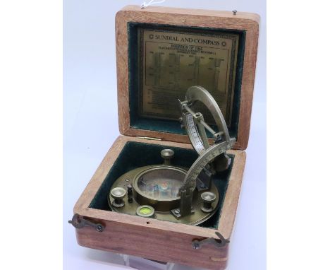 Brass sundial and compass, marked Steward London, boxed. P&amp;P Group 1 (£14+VAT for the first lot and £1+VAT for subsequent