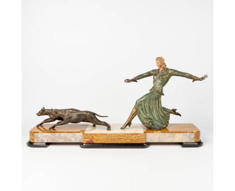 Jacques LIMOUSIN (XX) A lady with dogs made of spelter during the art deco period, the first half of the 20th century. Condit