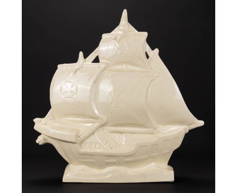 A ceramic Caravel sail ship made of faience in art deco style and marked C. Declercq. (10 x 46 x 46 cm)