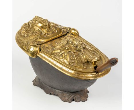 An antique 'coal bucket' made of gold-plated bronze in Louis XVI style on a base made of cast iron. 19th century. (53 x 32 x 