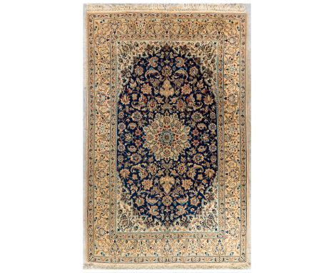 An Oriental hand-made carpet. Keshan. (119 x 185 cm)