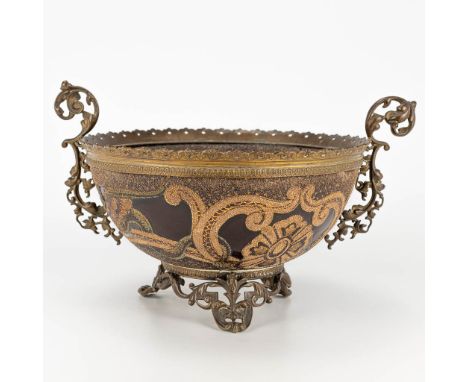 A ceramic bowl mounted with bronze in Louis XV style, 19th century. (34 x 20 x 25 cm)