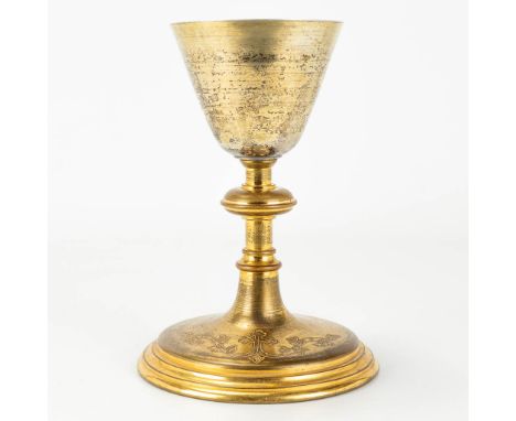 A gilt neogotich chalice, made of gold-plated brass. The first half of the 20th century. (18 x 12 cm)