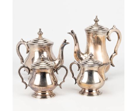 A coffee and tea service, consisting of a coffee pot, tea pot, sugar pot and milk jug made of silver-plated metal. (10 x 24 x