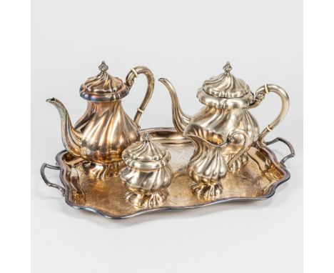 A 4-piece coffee and tea service made of silver and marked 0,835. Standing on a silver-plated serving tray. (30 x 47,5 x 22 c