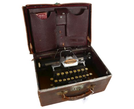BLICKENSDERFER - a Blick featherweight aluminium typewriter, in suitcase with original instruction manual 