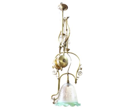 A Victorian brass cantilever pendant lamp with glass shade 