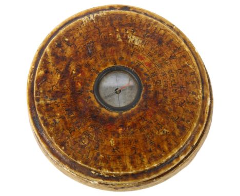 A Chinese wooden-cased celestial calendar compass, diameter 10cm 
