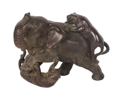 A Meiji Period Japanese cast-bronze sculpture "elephants with tigers", signed to the base, height 15cm 