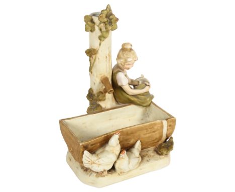 Royal Dux group, girl and hens by a trough, height 25cm 