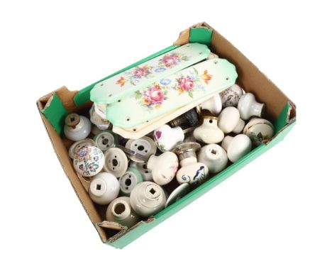 A box of ceramic and other door knobs, and various ceramic finger plates 