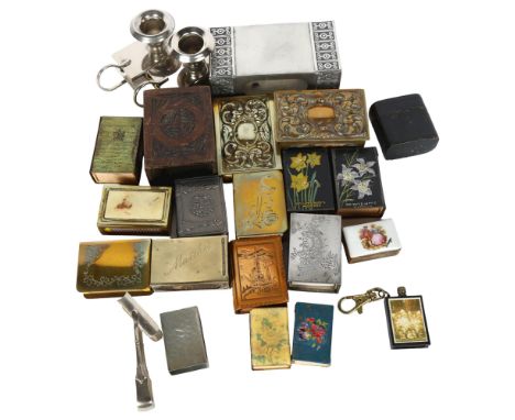 A collection of Vintage and other matchbox covers, and a pair of combination matchbox cover chamber sticks 