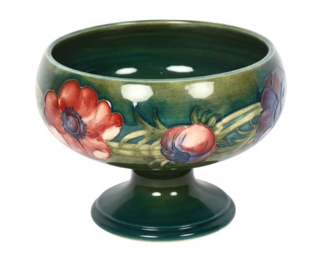 MOORCROFT - a tube-lined Anemone decorated pedestal bowl, signed to the base, diameter 16cm, height 11.5cmGood overall condit