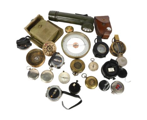 A group of Vintage military and other compasses, including the Magnapole, and a 1942 brass compass by T G Company Ltd etc