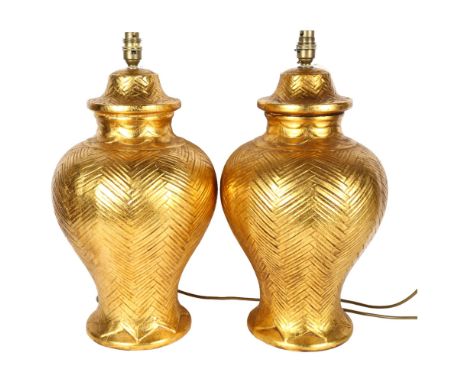 A pair of large modern gilded ceramic table lamps, height 50cm 