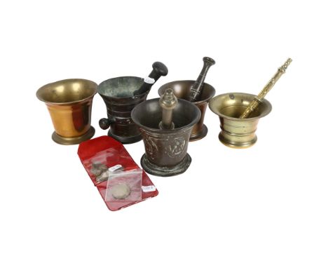 A group of 5 various bronze and brass pestle and mortars, and a small bag of coins 