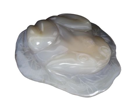 A carved jade toad on lily pad, length 12cm 