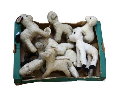 A group of soft Plush animals, to include 2 Steiff lambs, a musical lamb, and 7 others 