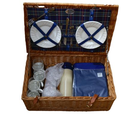 An Optima wicker hamper and contents 
