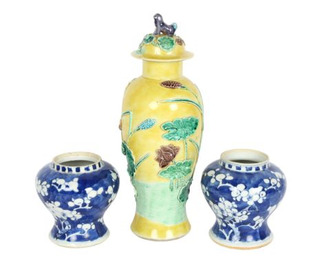 A pair of Antique Chinese blue and white vases with prunus decoration, height 11cm, and a yellow ground Chinese baluster vase