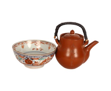 A Chinese Yixing teapot with incised decoration, and a small 19th century bowl, diameter 15cmTeapot good overall condition, s