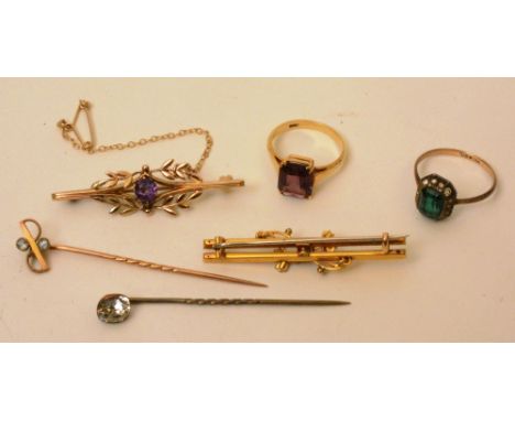 A 9ct gold amethyst and seed pearl bar brooch, 2.3g, together with another 9ct gold and amethyst brooch, 2.4g, an 18ct gold a