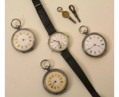 Three silver fob watches, early 20th century, all with enamel dials and Roman numerals, together with a vintage silver mounte