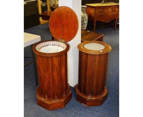 Two Victorian mahogany cylinder shaped pot cupboards, almost matching, both with marble insets to top, above a faceted column