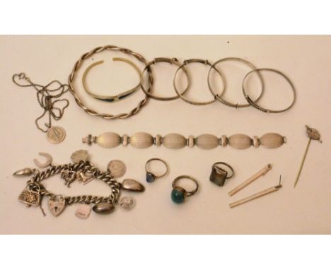 A collection of various silver jewellery, to include a charm bracelet, five child's bangles, a large bangle, a link bracelet,