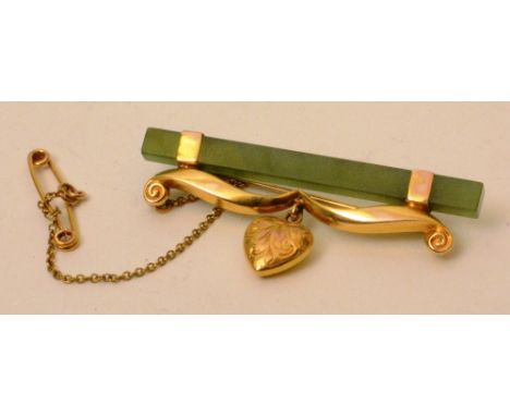 A Victorian 9ct gold and jade type heart brooch, the jade type bar fixed with gold scrolling and drop heart to centre, 4.3g, 