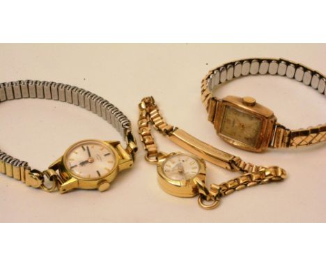 A 14ct gold Roamer lady's watch, together with a 9ct gold Rotary watch and another Rotary watch (3)