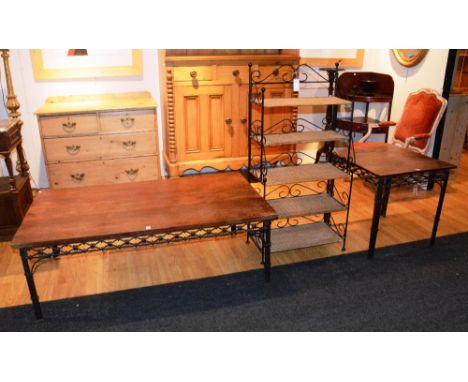 A modern hardwood coffee table, raised on wrought iron stand, 46cm high x 135cm long, with matching lamp table, 60cm high x 6