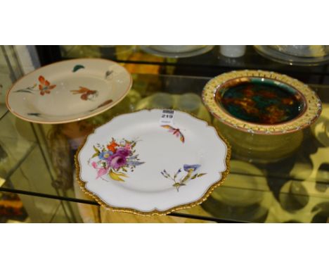 A late 19th / early 20th century porcelain Worcester plate, decorated with colourful hand painted flowers and butterflies on 