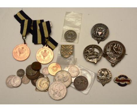 Four early 20th century silver military badges, one with hallmarks for Edinburgh, bearing crests to all examples, together wi