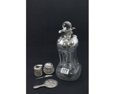 Hallmarked silver and glass decanter, plus four other silver or white metal items to include a hand mirror