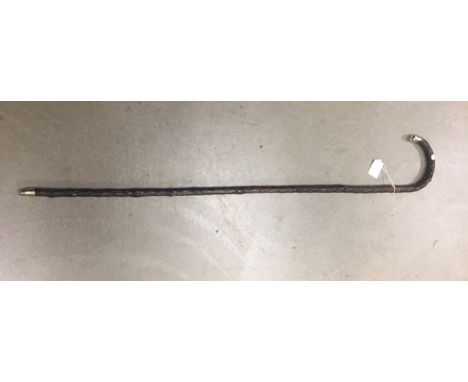 Walking stick with clasp silver tip, London 1918 and one other walking stick 