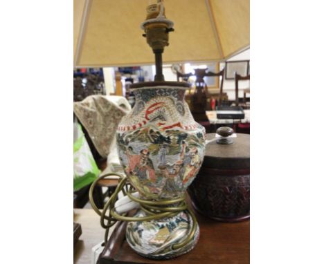 A Japanese satsuma vase converted to a lamp, decorated with various male figures throughout 