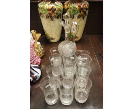A 19th century decanter, along with 11 glasses and a etched bowl in the form of a hat