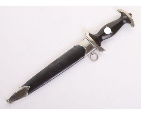 THIRD REICH SS (SCHUTZSTAFFEL) DRESS DAGGER BY CARL EICKHORN, ebony grip with nickel silver eagle and enamel SS runes. Some s