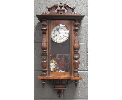 A small size Vienna wall clock, spring gong strike movement, typically cased, 75 x 33cm
