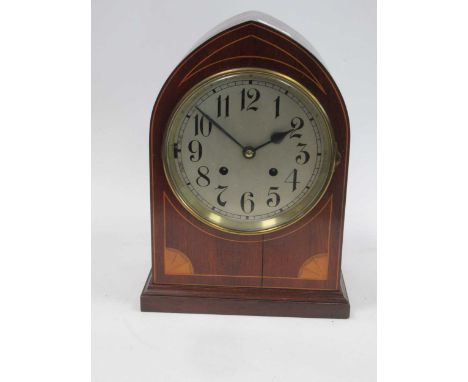 An Edwardian mahogany mantel clock of pointed arch from33cm high