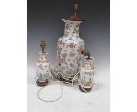 Three Chinese reproduction porcelain lamp bases, tallest 53cm 