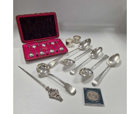 A collection of silver flatware including a cased set of seal topped spoons, together with 2 silver napkin rings, 20.8ozt gro