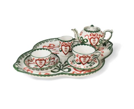 A Wemyss 'Queensberry House' cabaret set, circa 1895, comprising a quatrefoil serving tray, a teapot and cover, a milk jug, a