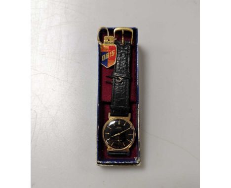 A gold-plated watch by Oris with the original box and swing tagThe watch is in working order but has not been tested for time