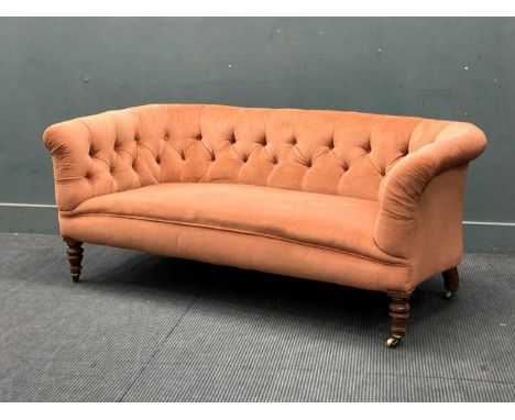 An Edwardian button back chesterfield type sofa, rear leg stamped 'GREGORY &amp; CO'66 x 160 x 80cmStamped back right leg. Le