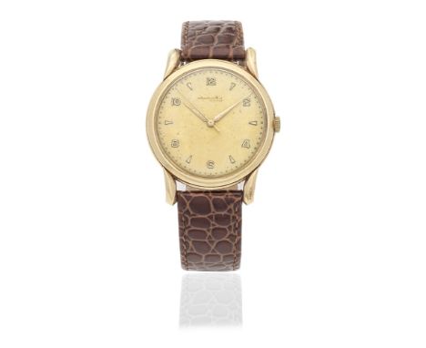 International Watch Company. An 18K gold manual wind wristwatchDate: Circa 1950Movement: Jewelled manual wind, No.1321395Dial