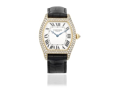 Cartier. An 18K gold diamond set manual wind wristwatchModel: TortueReference: 2496Date: Circa 2010Movement: 18-jewel Cal.430