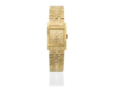 Rolex. A lady's 18K gold manual wind square bracelet watchModel: PrecisionReference: 2157Date: Circa 1960Movement: 18-jewel C